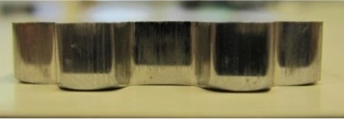 板厚6mmブランキング製品のせん断面（断面）写真